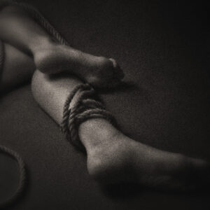 Picture of feet bound with rope. Original image by Shibari Kinbaku from Pixabay.