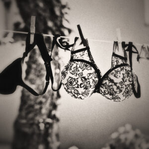 Picture of bra's hanging over a clothes line. Source Pixabay.com.