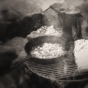 Picture of a breakfast being cooked over an open fire. Source Pixabay.com.