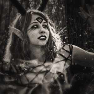 Picture of a demon woman with horns, fans, and pointy ears. Source Pixabay.com.