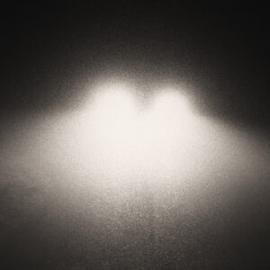 Picture of car headlights in the fog. Source Pixabay.com.
