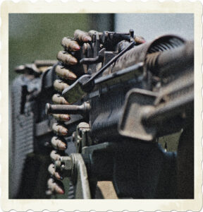 Picture of the rear end of a M60 Machine Gun with ammunition on the tray. Image by Zack Culver from Pixabay.