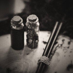 Picture of prepared vials and ingredients used for potions. Source Pixabay.com.