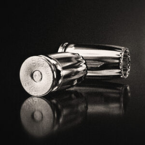 Picture of two shell casings and their reflections without a projectile. Source Pixabay.com.