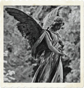 Picture of a stone angel with wings outstretched. Image by S. Hermann and F. Richter from Pixabay.