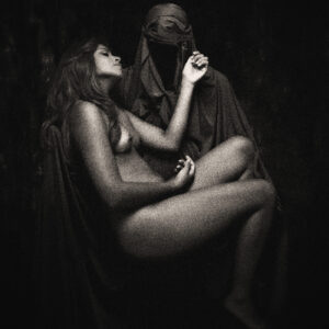A picture of a woman in the nude being embraced by Death. Source Pixabay.com.