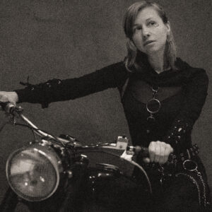 Picture of a woman on a motorcycle. Source Pixabay.com.