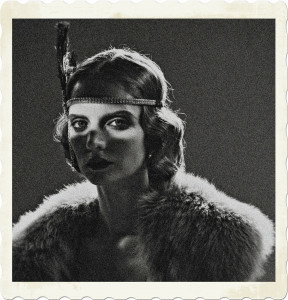 Picture of a flapper with an intense state. Wearing a band with a feather. Image by Cottonbro on Pexels.