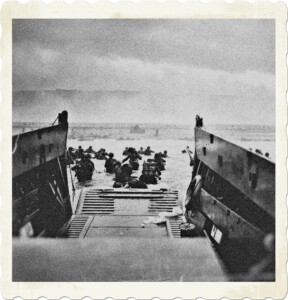 Historical picture of a landing craft with the door wide open and soldiers out in the water wading ashore. Smoke appears in the distance and potentially a tank.