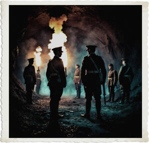British soldiers standing in a dark underground mine, flares glowing in the background show their silhouettes, an officer approaches from behind. Clothing and style appropriate for 1915 for No Man Land at night.