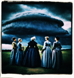 A dark storm cloud forms above the head a Rotund Countess with grey hair surrounded by her female servants. Background and clothing appropriate to 16th Century France.
