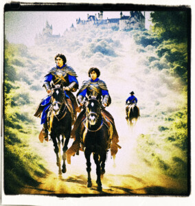 Man and a boy with matching uniforms and armour, riding through the woods on horse, with a castle in the distance.