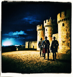 A couple of soldiers acting as sentries in the night, near an old Spanish fortification. Background and clothing appropriate to the 16th Century France.