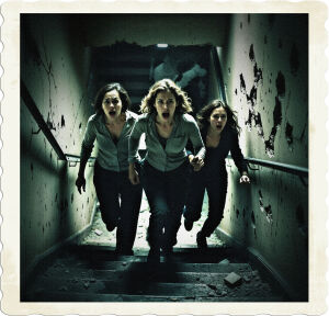 a dramatic, high-contrast, cinematic photograph of three women, each with distinct facial features and skin tones, fleeing in terror through a dark, dimly lit stairwell, the walls around them scarred and chipped from intense gunfire, with bullet holes and shattered concrete fragments scattered on the ground, the air thick with tension and fear, as they desperately seek escape from the danger lurking above, captured in a gritty, realistic style with muted colors, deep shadows, and a sense of urgency.